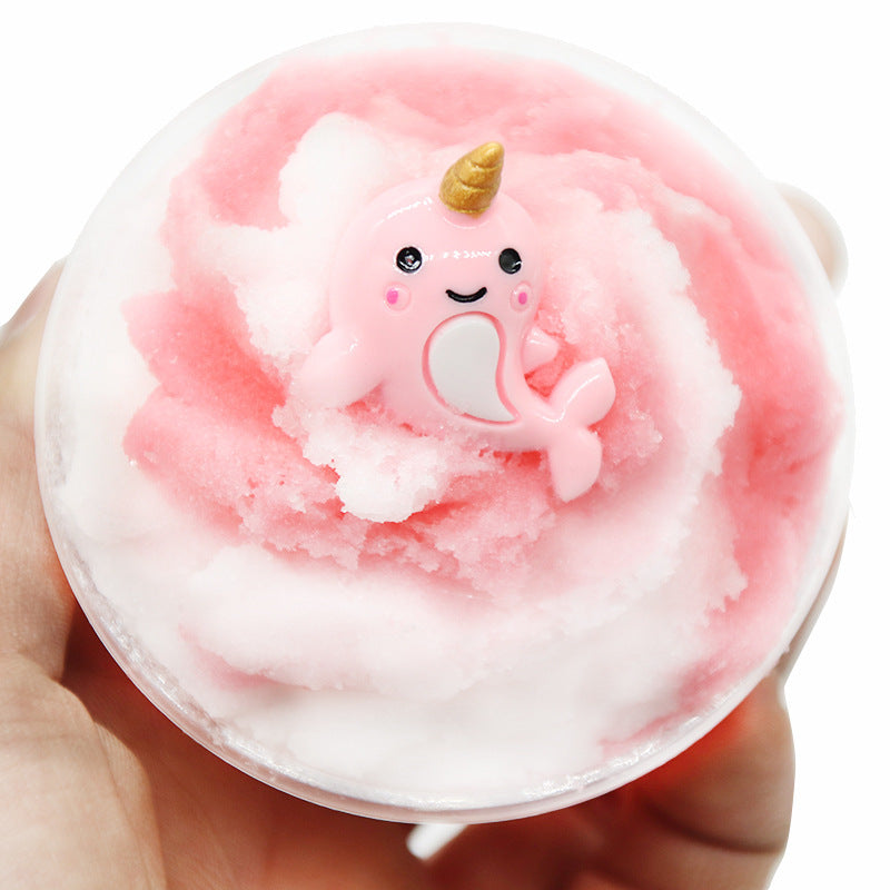 Pink slime jar with unicorn-face charm and small gold horn