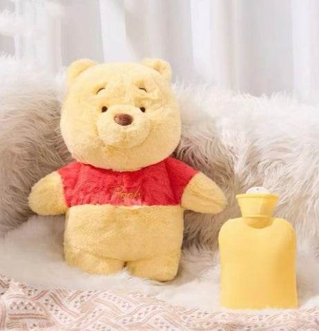 Yellow plush cartoon hot water bottle with bear design and screw cap
