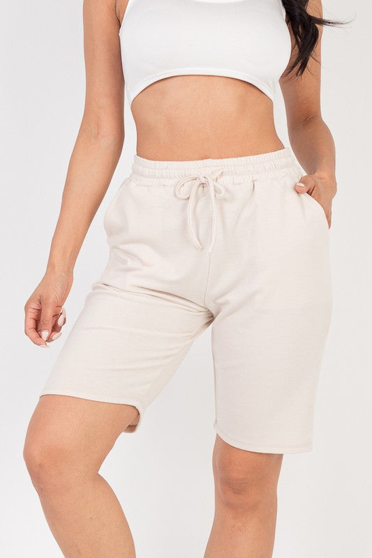 French terry bermuda shorts in light beige/cream with elastic drawstring waist