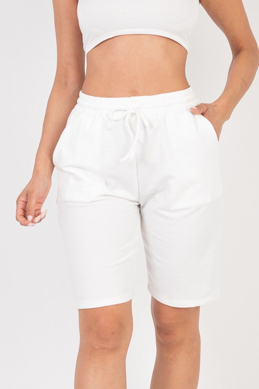 French terry bermuda shorts in white with elastic waistband and drawstring