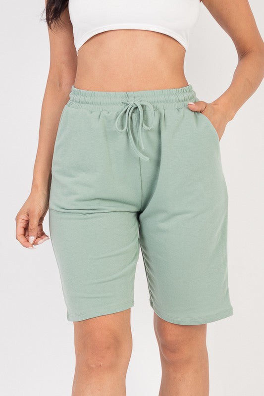French terry bermuda shorts in mint green with elastic drawstring waist