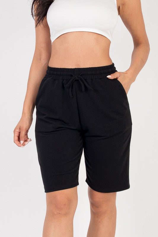 French terry bermuda shorts in black with elastic waistband and drawstring