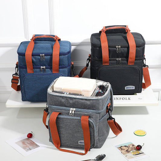 Insulated lunch bag cooler crossbody, blue and black designs with orange handles