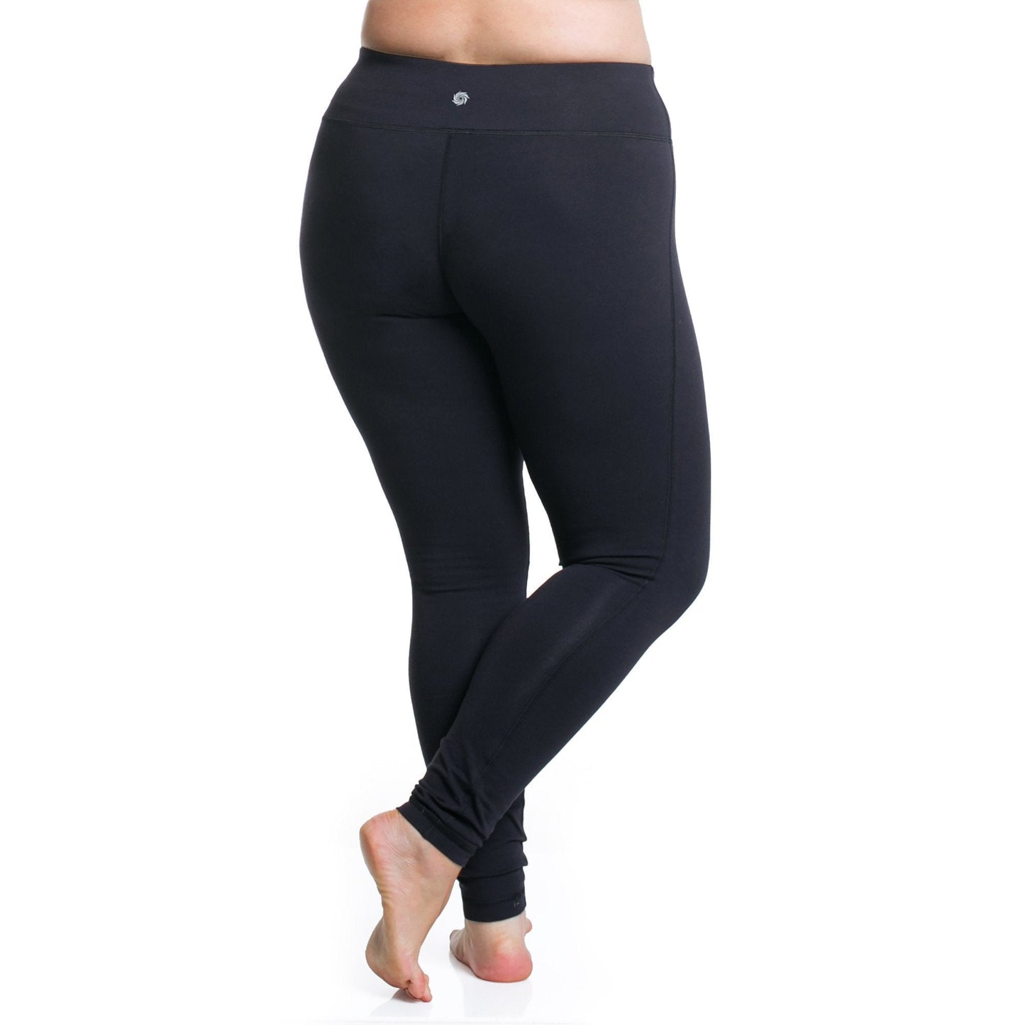 Dark leggings with contoured seams, fitted full-length design