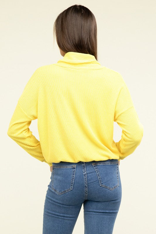 Yellow textured knit pullover top with shawl collar and button placket, elastic waist hem