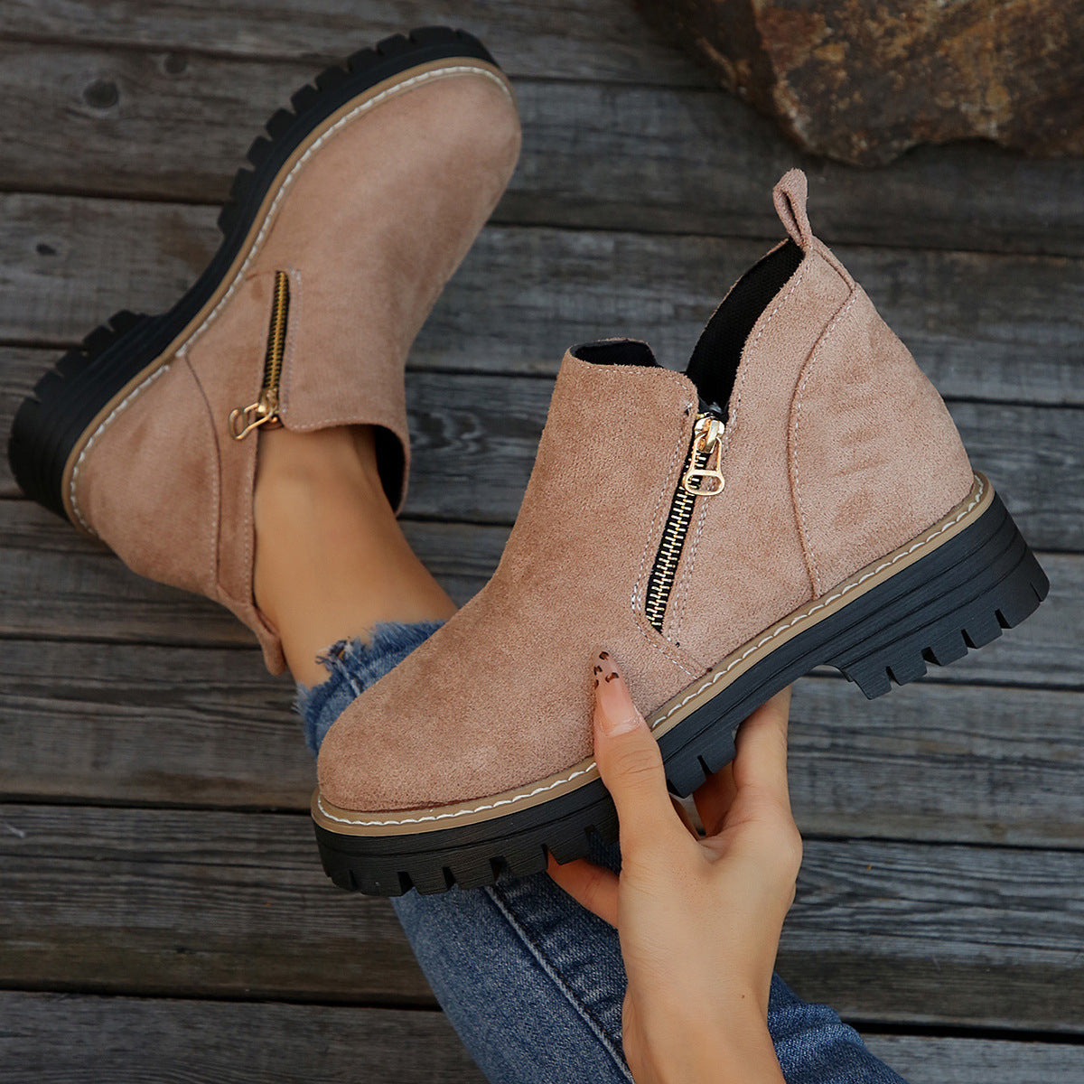 Light tan suede ankle boots with side zipper and chunky black lug sole