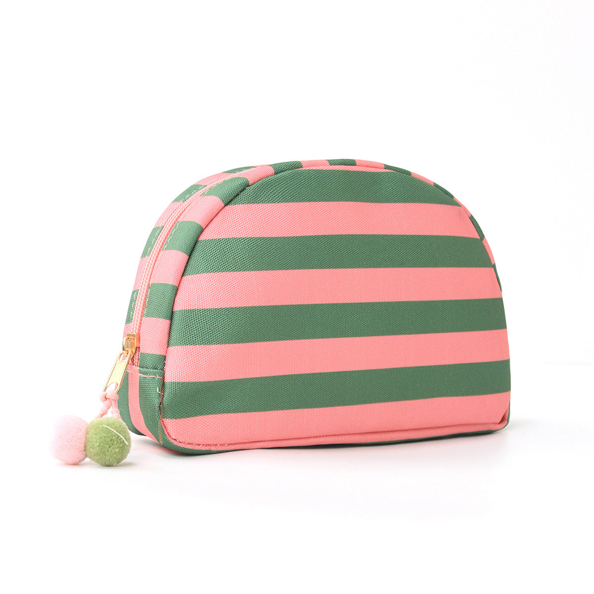 Striped shell makeup bag in green and pink with pom-pom zipper pull.