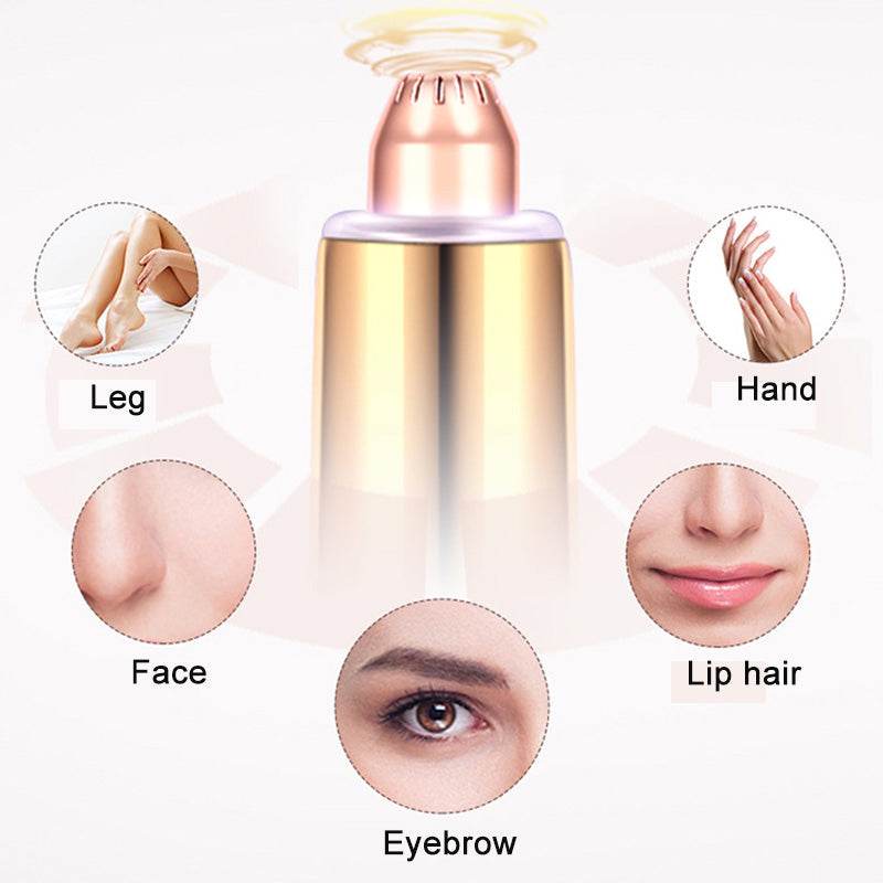 Electric eyebrow trimmer with metallic gold cap and lavender trimming head
