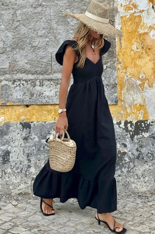 Black smocked maxi dress with tiered skirt and sleeveless V-neck