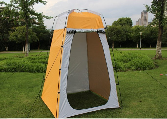 Outdoor shower/toilet tent, yellow canopy, white walls, front privacy door