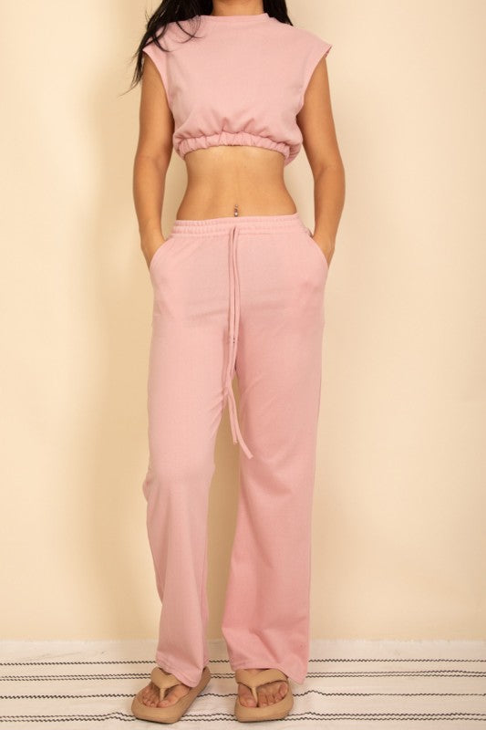 Dusty pink sleeveless crop top with elastic hem and wide-leg drawstring pants set