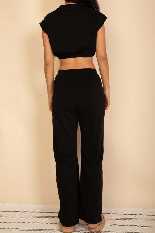 Black crop top and wide-leg pants set, elastic waist and cinched hem
