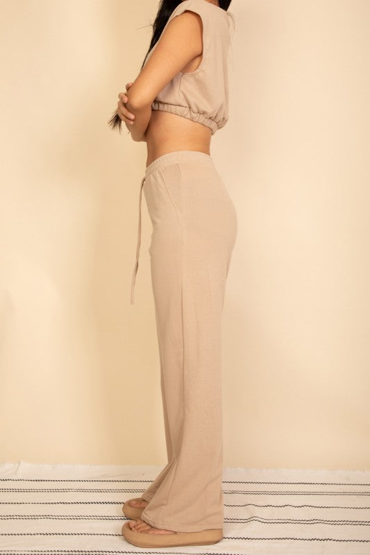 Sand beige wide-leg pants and cropped top set with elastic waistband and drawstring