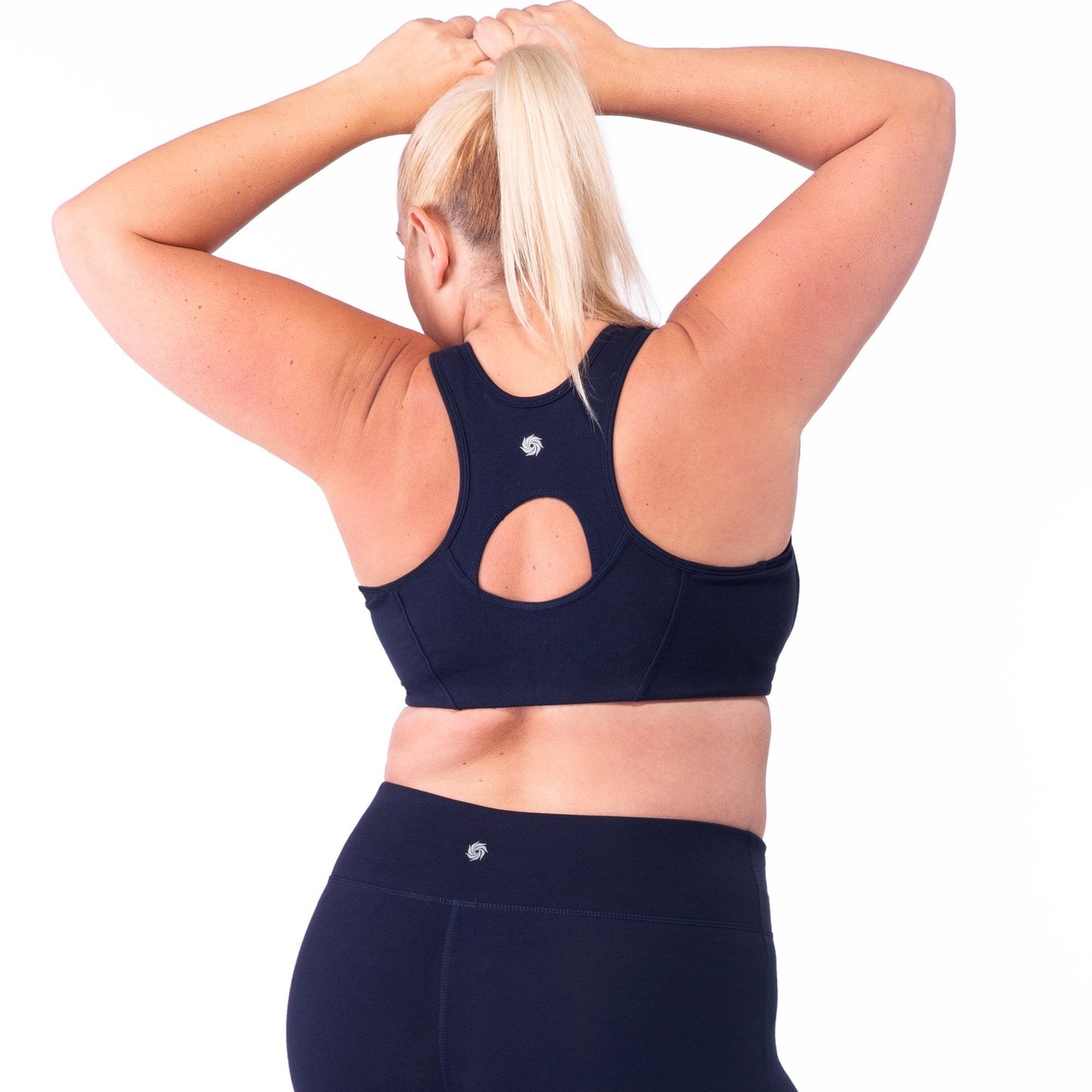 Navy zip-front bra back with keyhole cutout and racerback straps