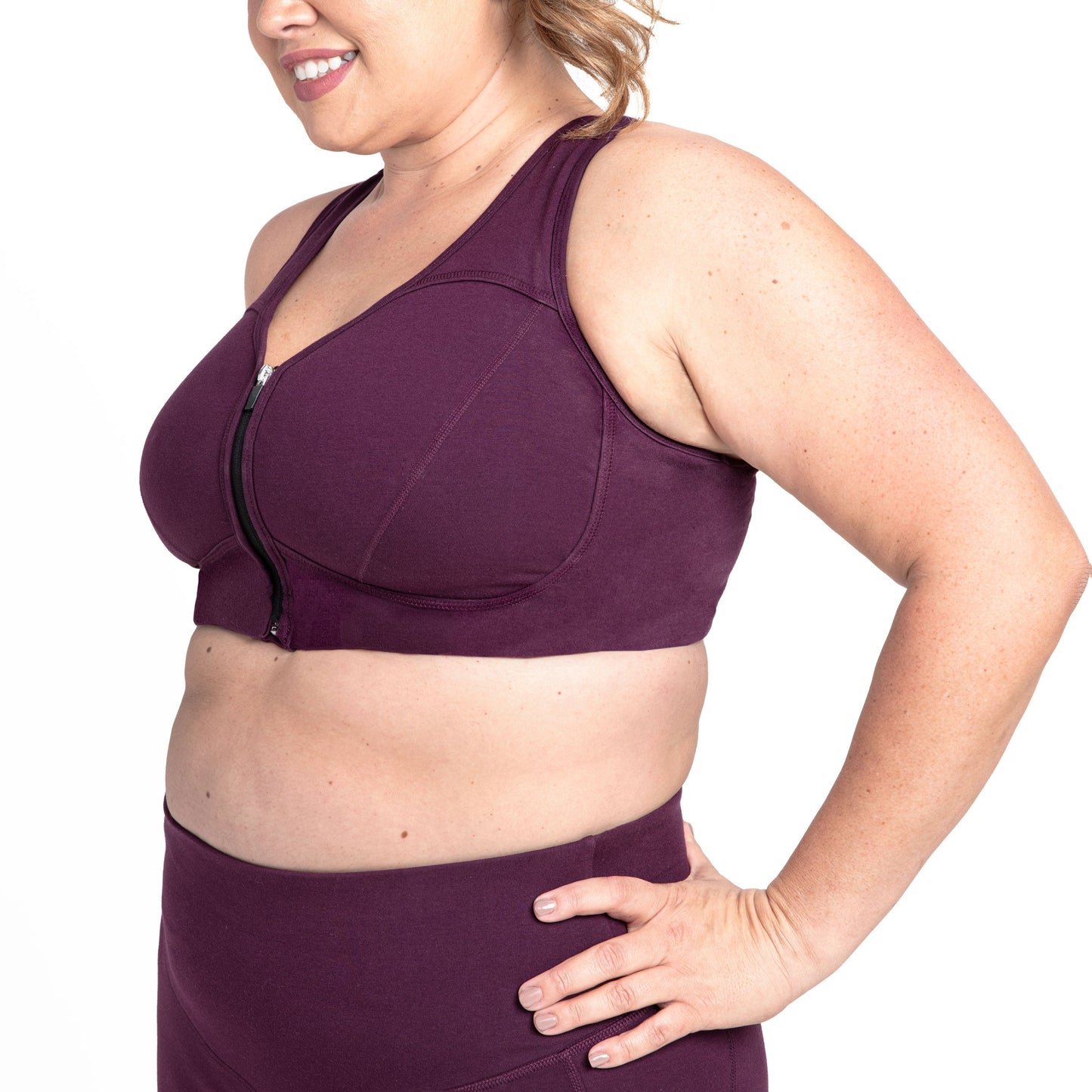 Purple zip-front bra side with center zipper and supportive cups