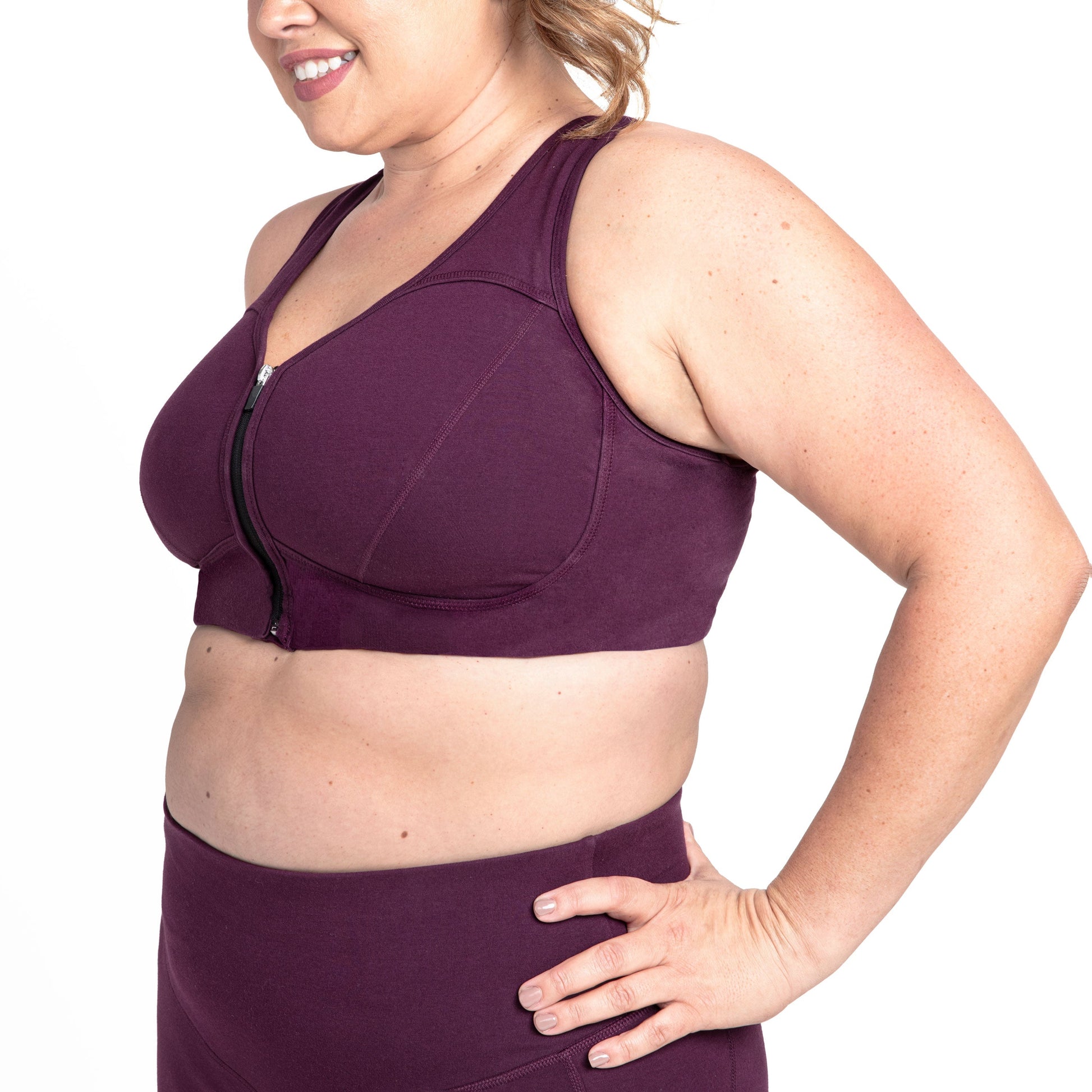 Purple zip-front bra side with center zipper and supportive cups