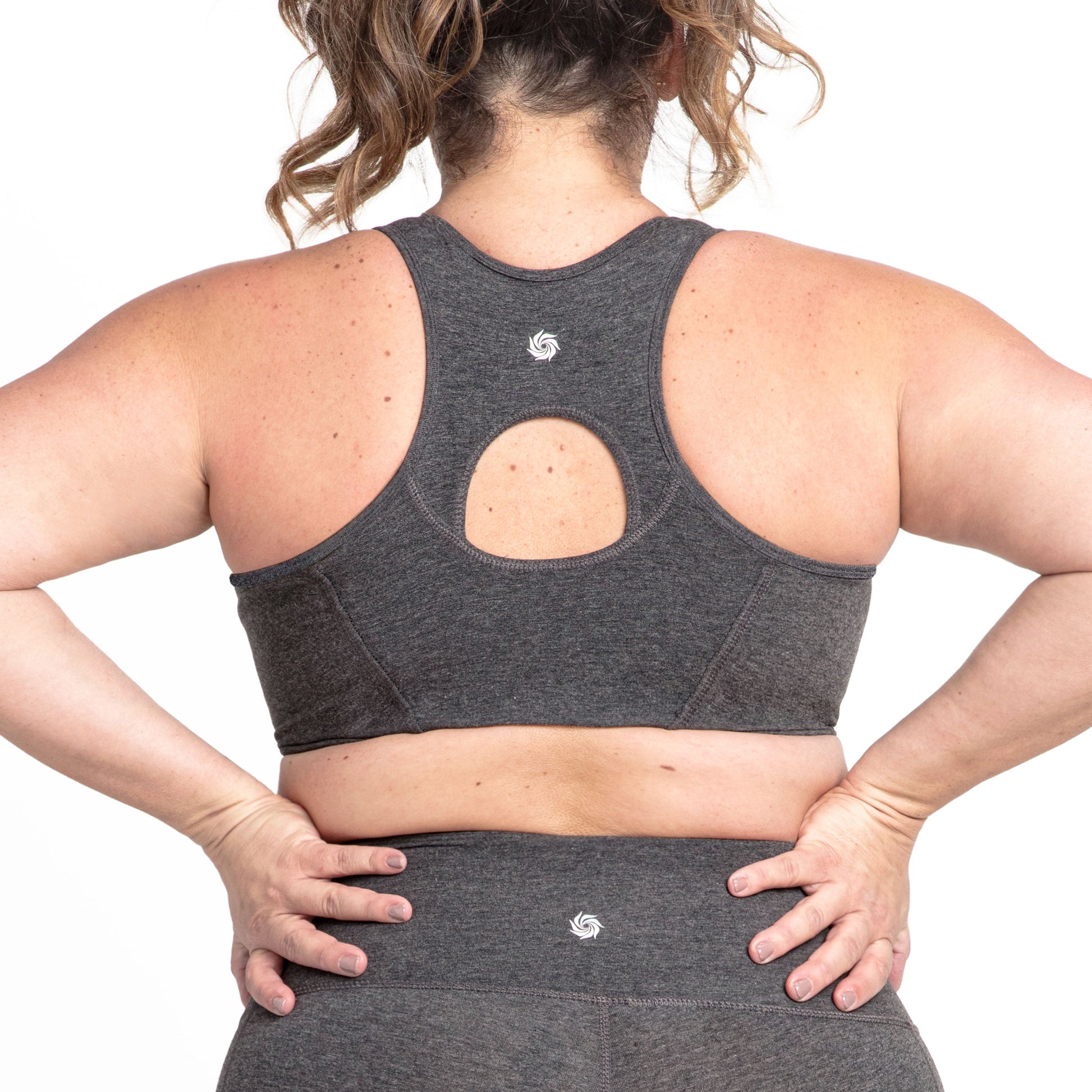Dark gray zip-front bra back with keyhole cutout and racerback straps
