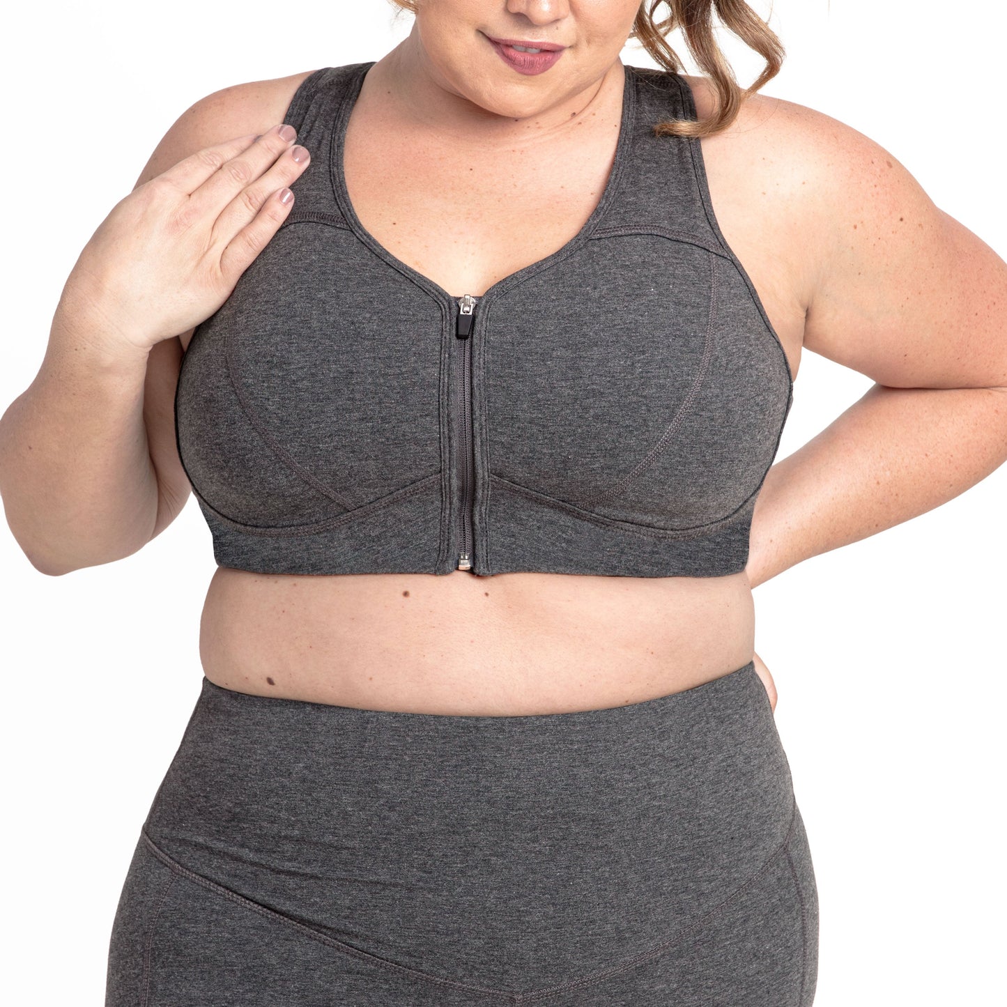 Dark charcoal zip-front bra with center zipper and supportive cups