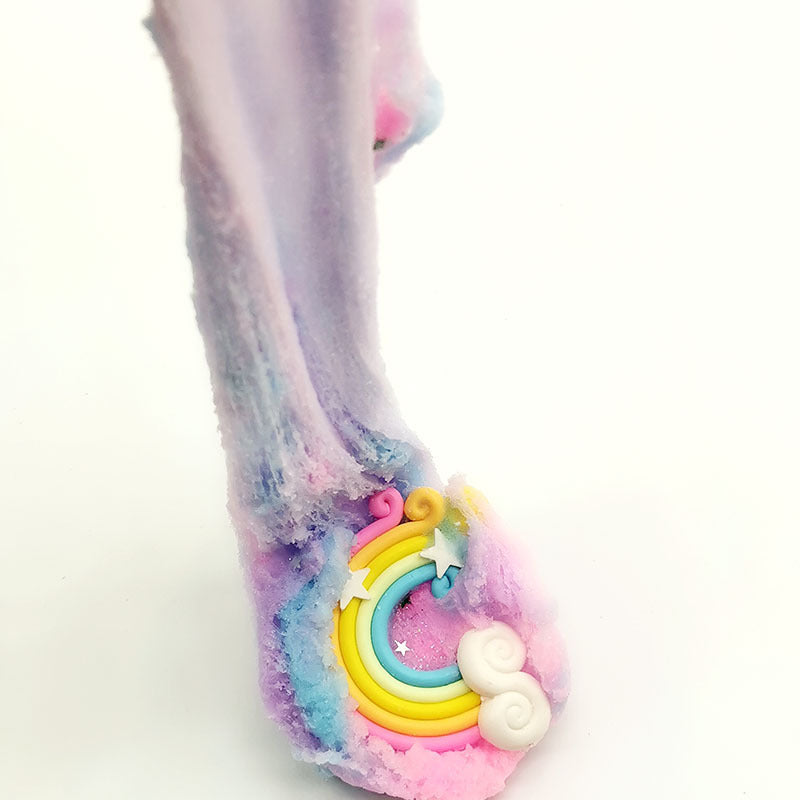 Stretchy purple slime with rainbow lollipop charm and star accents