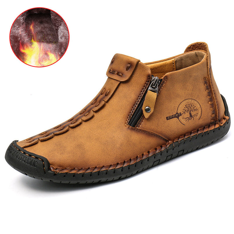 Men's ankle boots in tan brown with side zipper and stitched moc-style toe