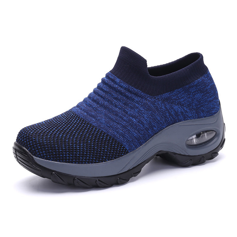 Blue knit slip-on sneakers with gray sole and air-cushioned heel