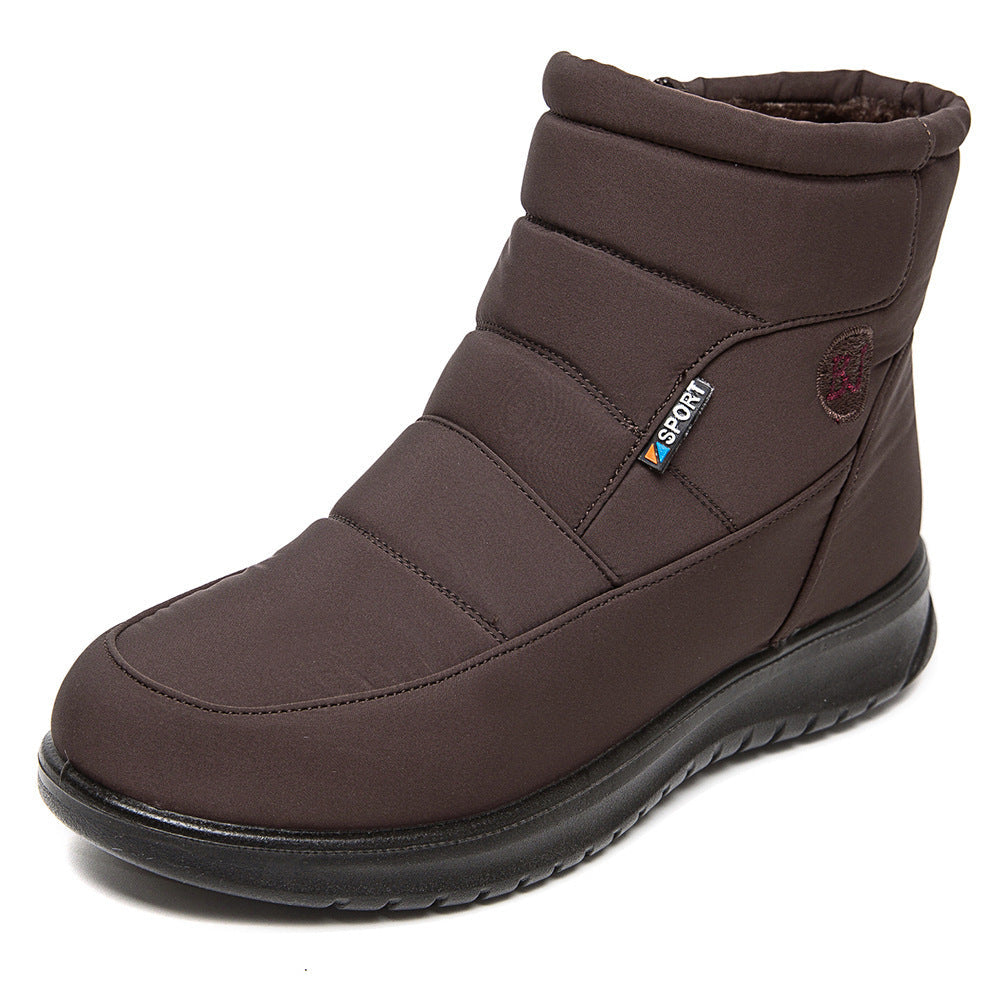 Women’s brown ankle boots with stitched panels and padded inner lining