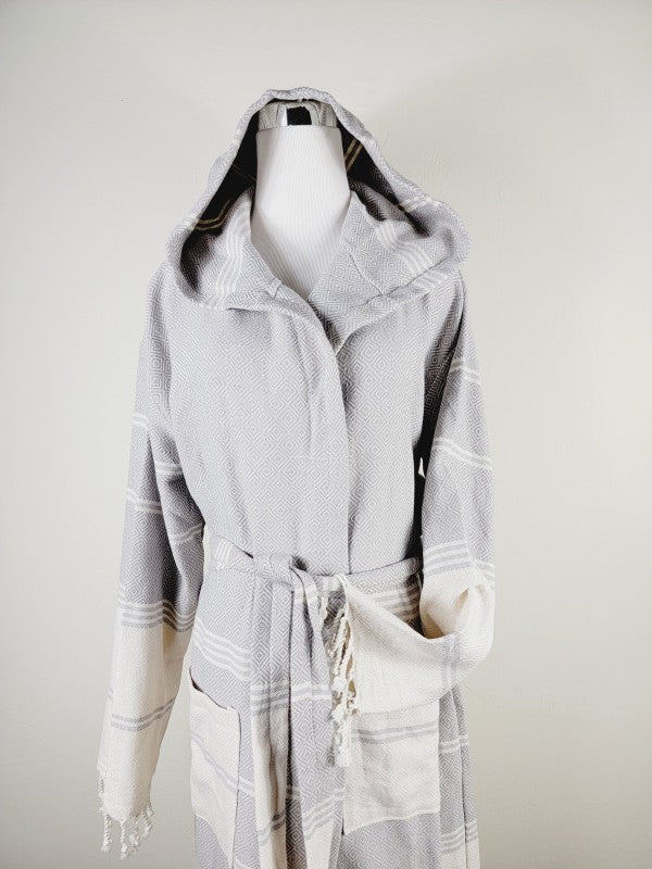 Gray hooded robe front view with tie belt and side pockets; striped geometric panels