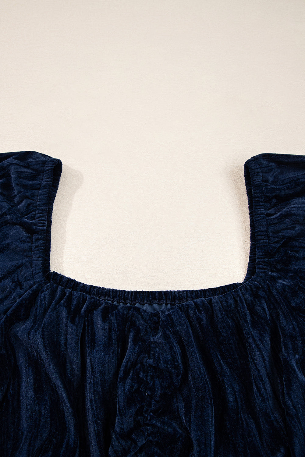 Navy blue square neckline dress with ruched puff sleeves and gathered bodice