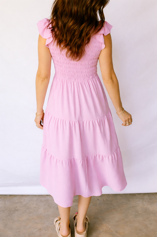 Pink tiered midi dress with smocked back and flutter cap sleeves