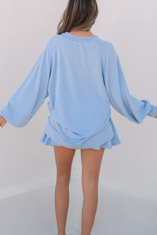Blue corded top and ruffle mini skirt set, long sleeves, crew neck, back view