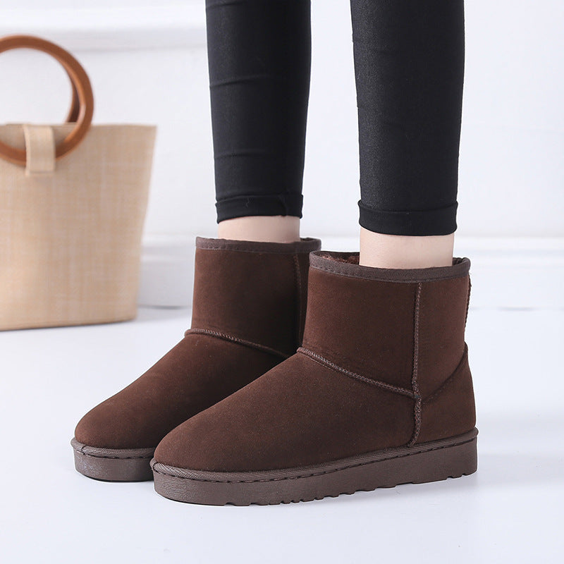 Women’s winter snow boots in brown suede with faux fur lining and thick non-slip sole