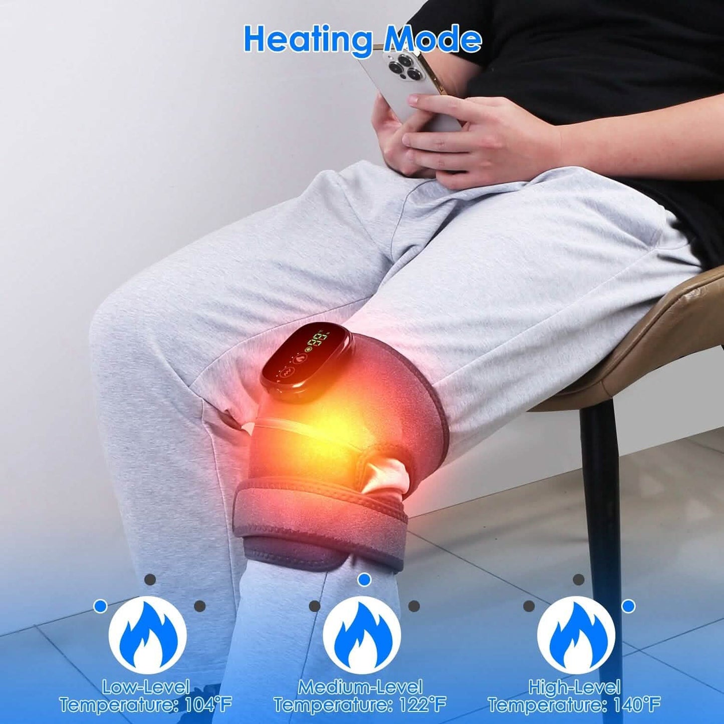 Heated pad with red glowing heating area, control buttons on pad, remote included