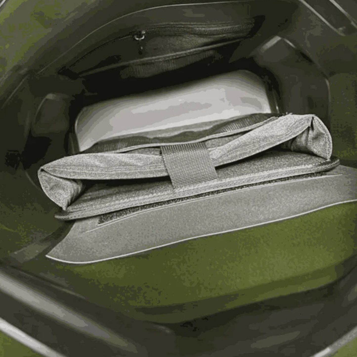 Dry bag interior with rolled accessory pouch inside waterproof liner