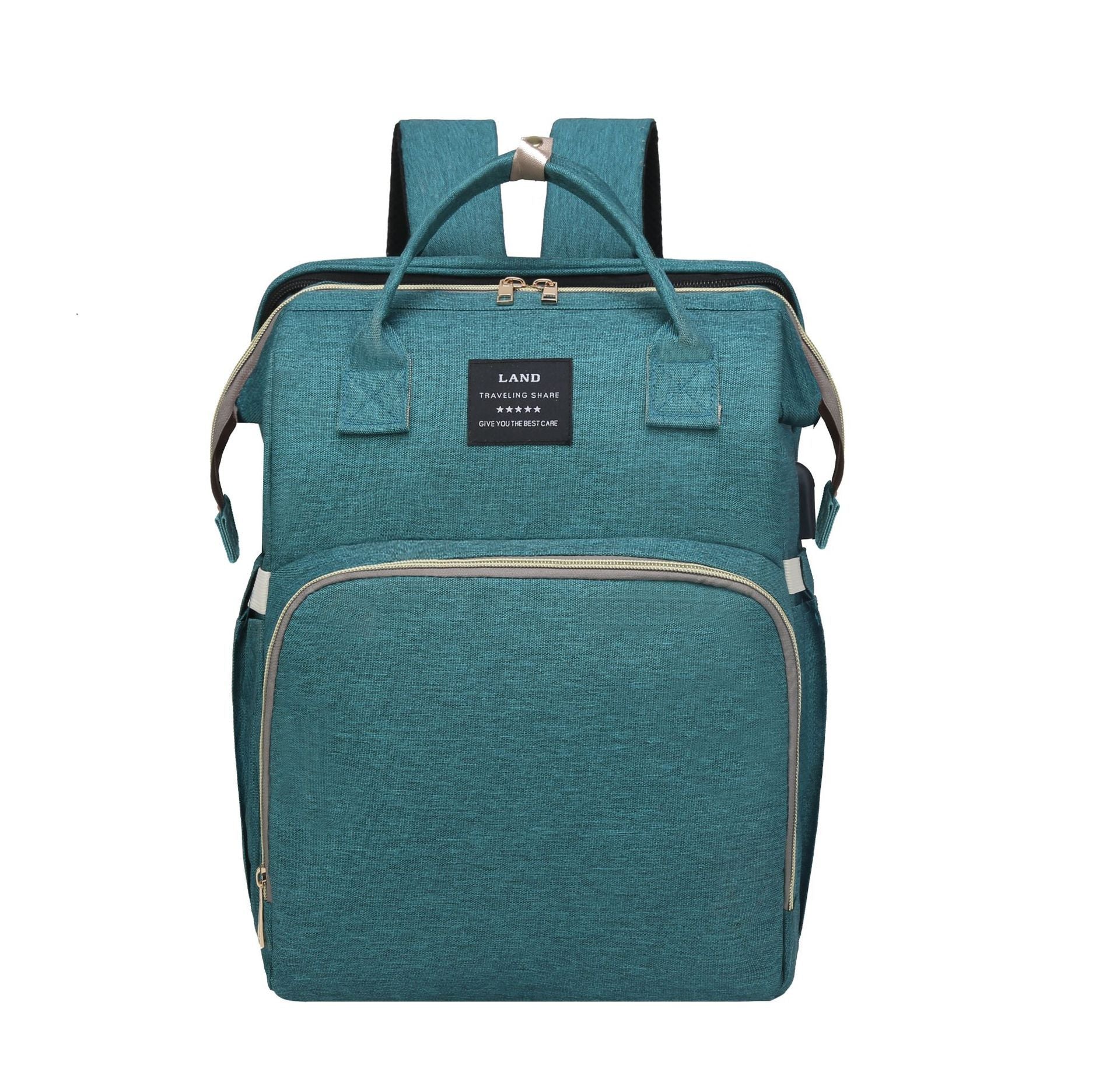 Teal insulated baby crib backpack with front zip pocket, top handle, and side straps