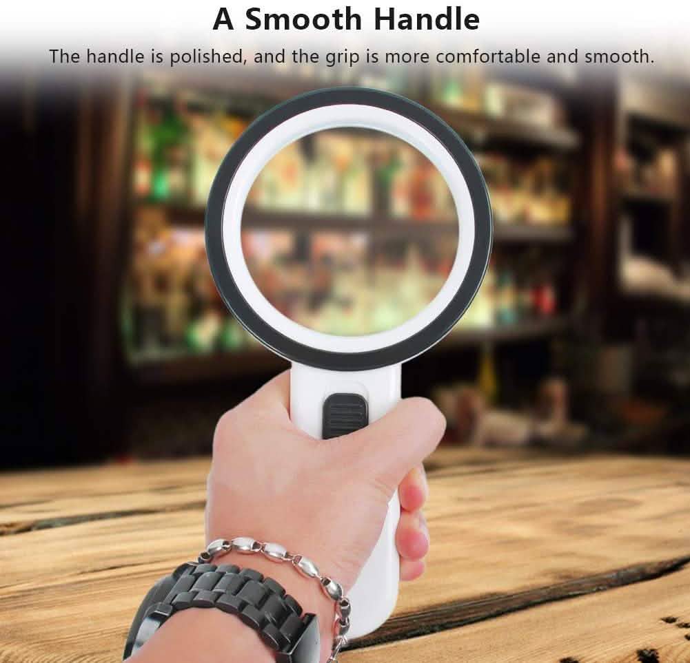 Handheld magnifying glass with 12 LEDs, white handle held in hand, black-rim lens