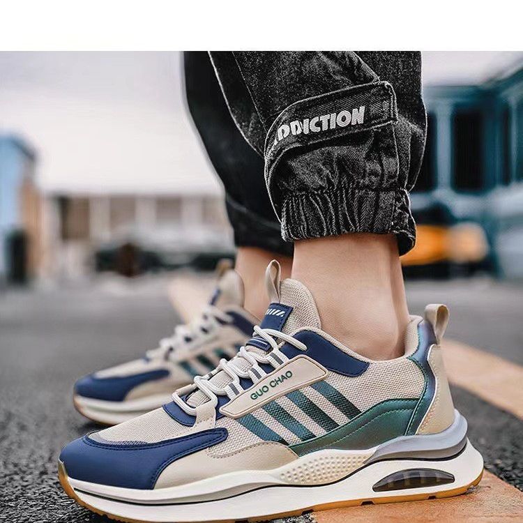 Breathable mesh sneakers in beige with navy trim and green stripe detail