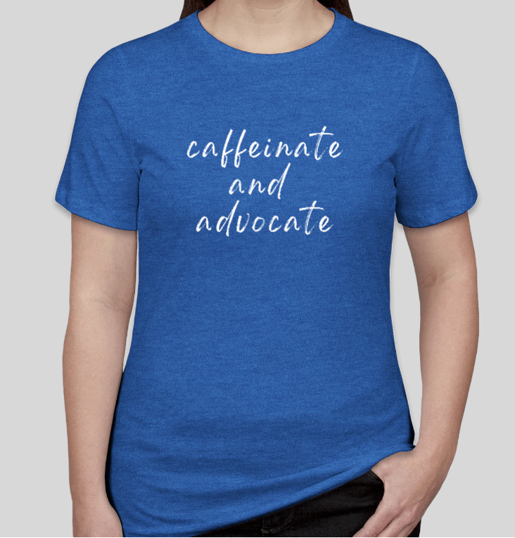 Blue crew-neck T-shirt with 'caffeinate and advocate' script text on chest