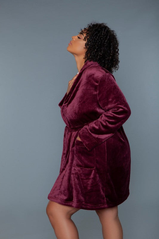 Burgundy plush hooded robe with wrap front and tie belt, side view