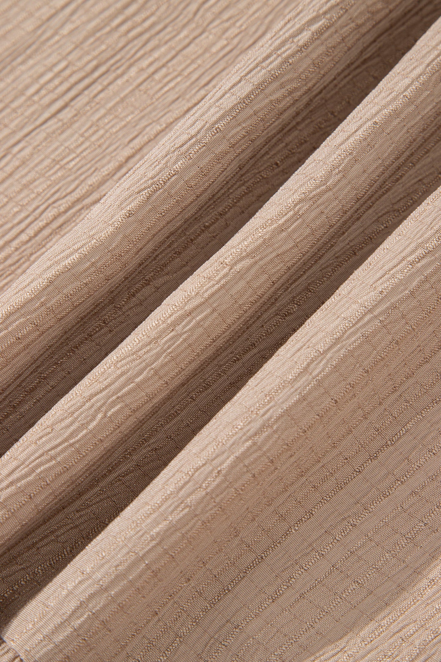 PLUS dark khaki textured woven fabric close-up with subtle vertical grain