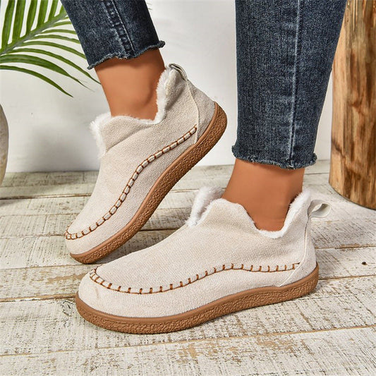 Women’s plush V-cut ankle boots, milky white suede with faux-fur trim and flat sole