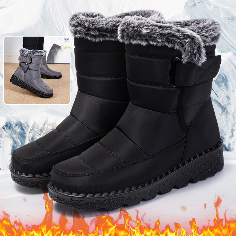 Black winter snow boots with faux-fur cuff and hook-and-loop strap, chunky platform sole