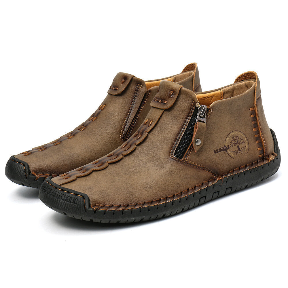 Tan men's ankle boots with side zipper and decorative stitch accents