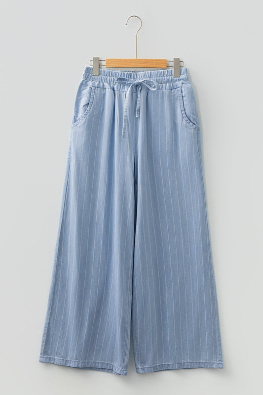 Sky blue stripe tied-waist elastic trousers with wide legs and side pockets
