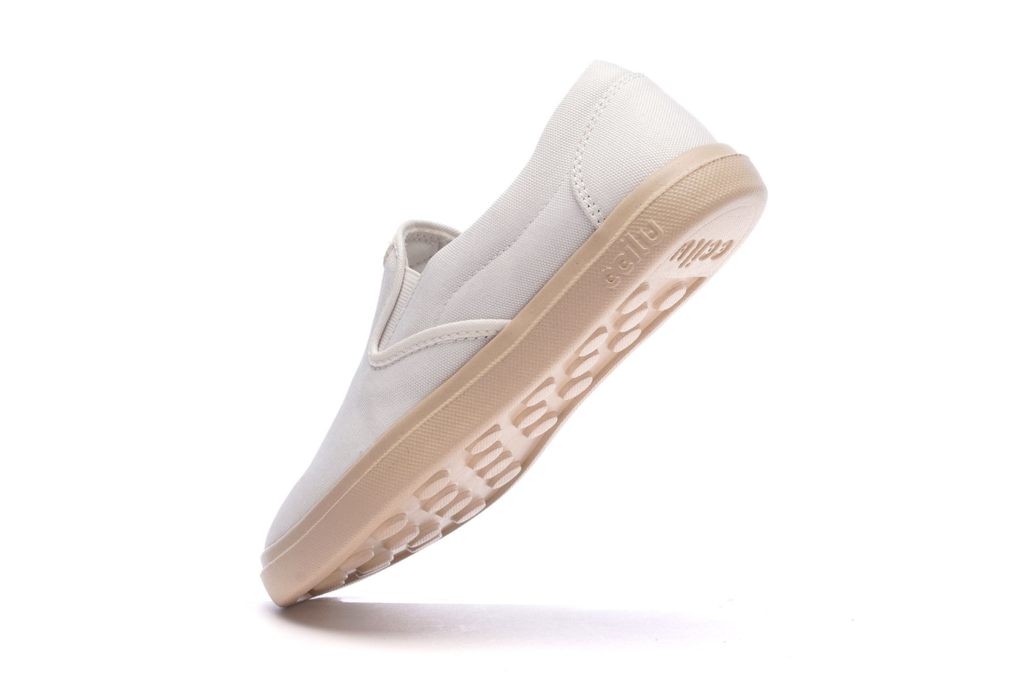 XPRESOLE Cody men's white slip-on shoes, side view of treaded sole