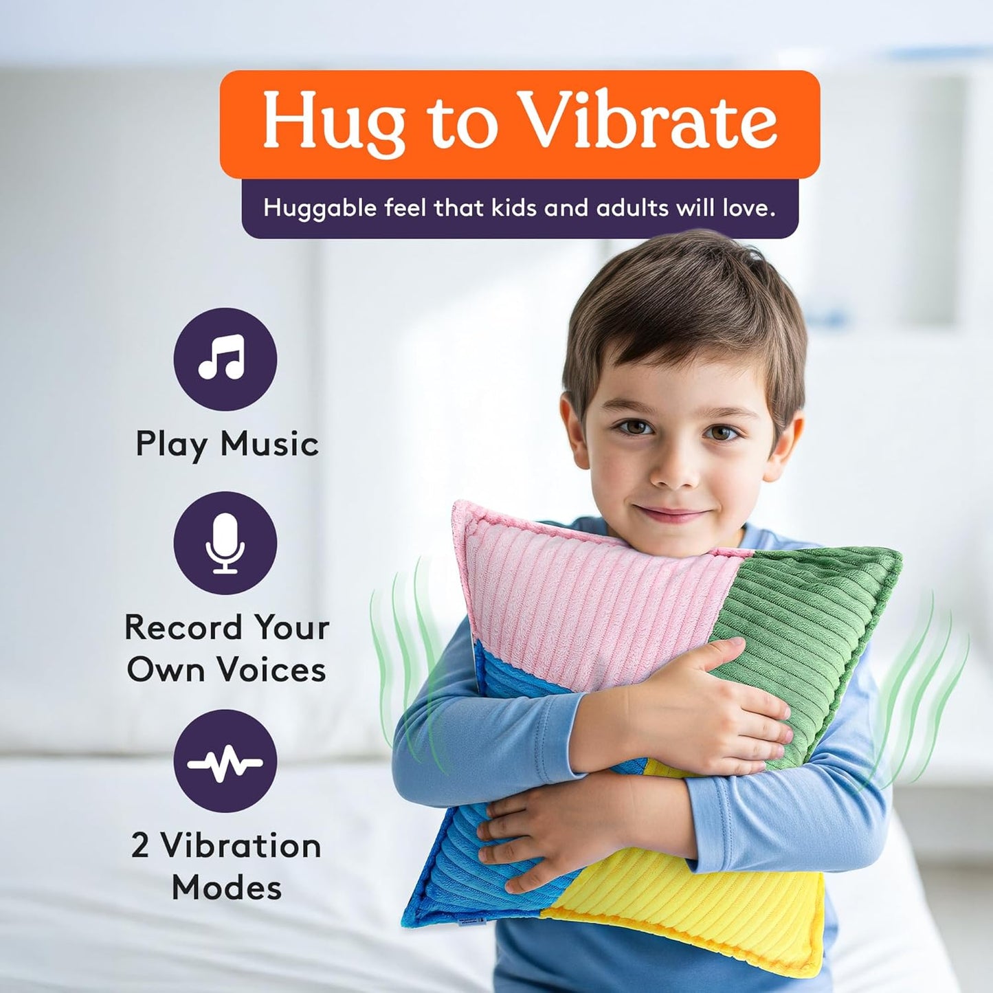 Rainbow striped plush sensory vibrating pillow held against a child’s chest