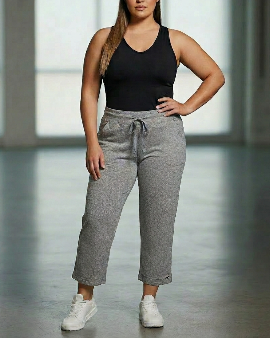 Relaxed capri pants, heather gray with drawstring elastic waist and cropped hems.
