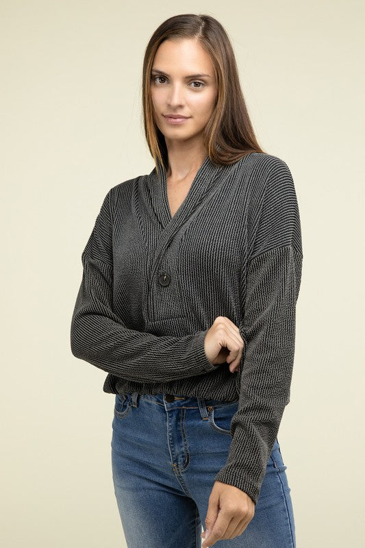 Black textured knit pullover top with V-neck shawl collar and button front, long sleeves