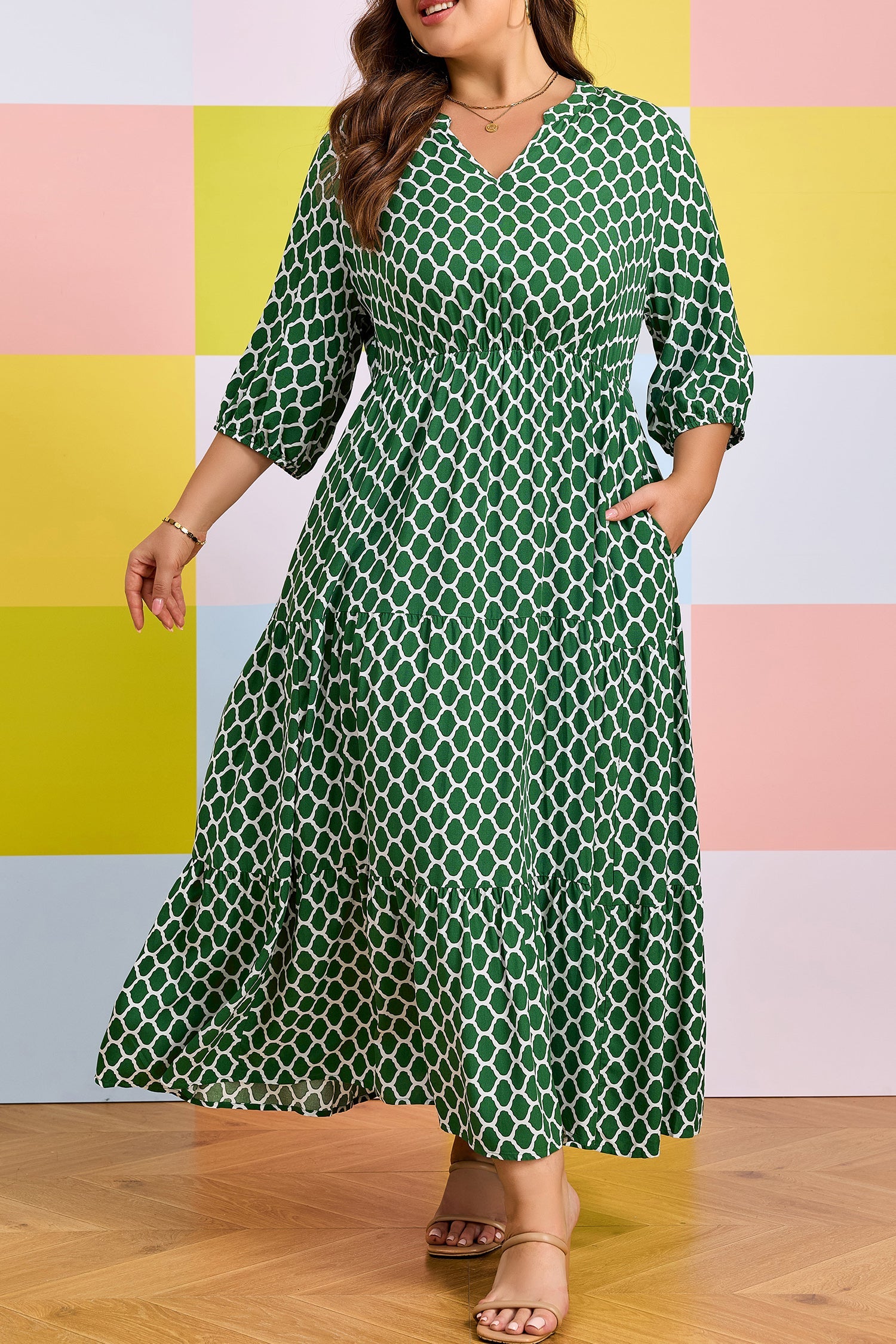 Green geometric-print PLUS casual dress with ruffled tiered hem and V-neck