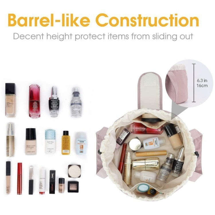 Barrel-style drawstring makeup bag, pale pink with open top and compact toiletries