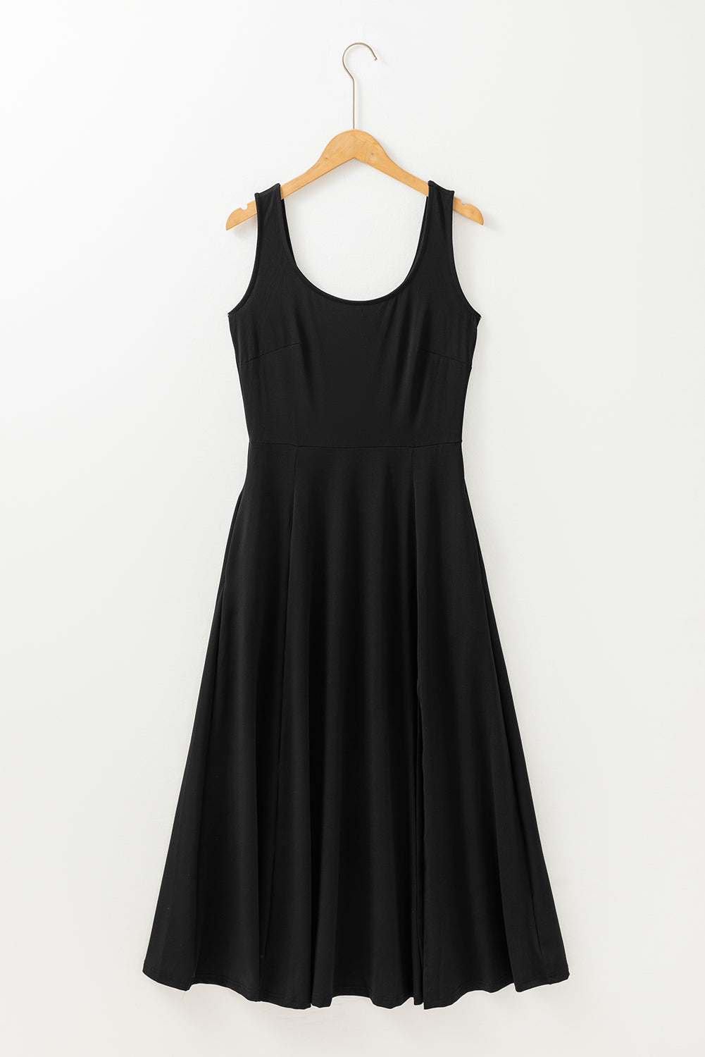 Black sleeveless flared midi dress on hanger with scooped back and pleated skirt
